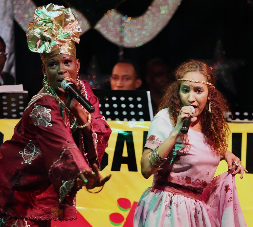 Josanne Rodriguez, left, and Empress Natty (Natalie Joseph Settle) perform Feel like Dancing at the Divas Calypso Cabaret International at Mas Camp Pub, Port of Spain on February 1, 2017.