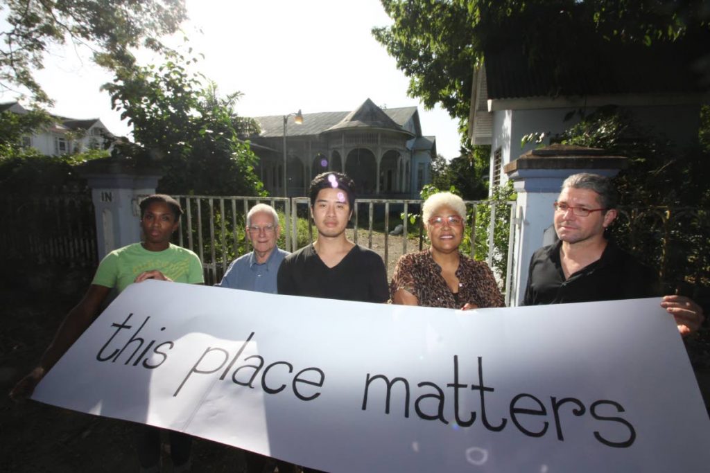 From left,  Abigail Charles, Geoffrey MacLean, Josh Lue Chee Kong, RudyLyn Roberts and Martin Mouttet extend the This Place Matters online campaign outside the former residence of the House Speaker, at 9 Mary Street, St Clair.
PHOTO BY ROGER JACOB