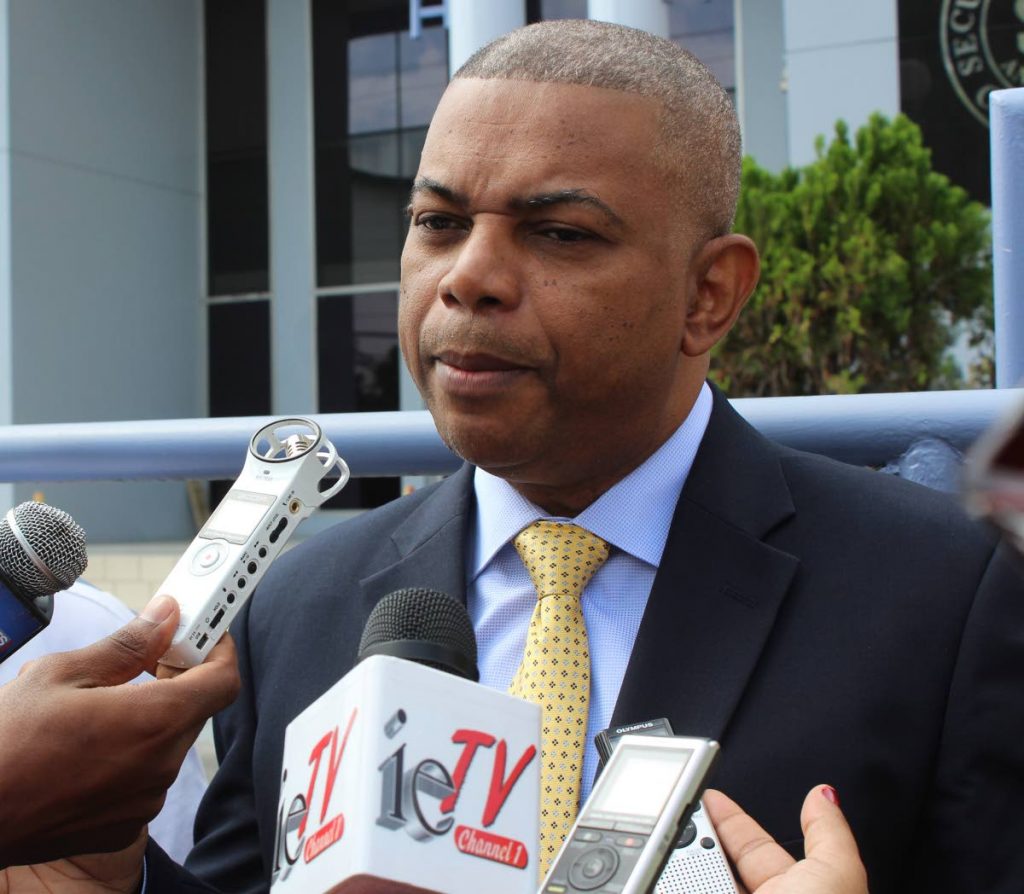 GHL minority shareholder Peter Permell talking to media on January 4 outside the TT Securities and Exchange Commission about Jamaica-based NCB Financial Group's take-over bid for TT-based Guardian Holdings Limited. PHOTO BY ENRIQUE ASSOON.