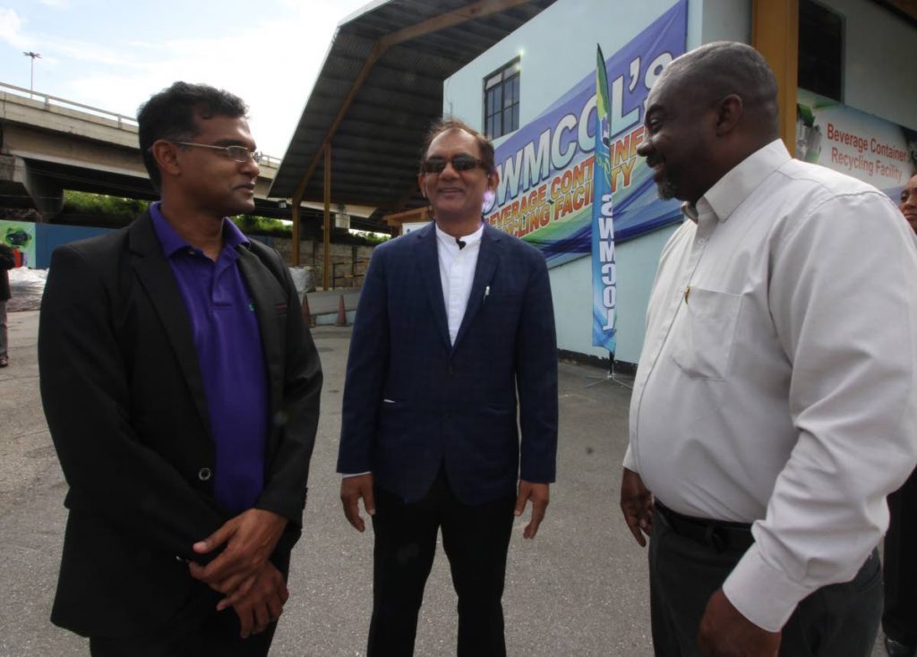 TALKING TRASH: SWMCOL CEO Ronald Road, chairman Shamshad Mohammed and project manager Dale Cozier at yesterday’s launch of the new plastic bottle treatment facility.