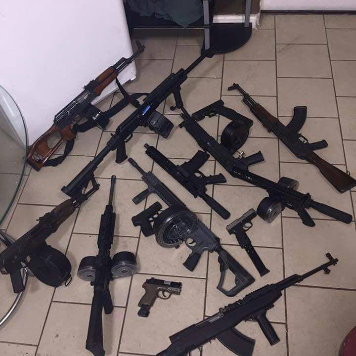 Several high powered assault rifles seized by officers of the Northern Division Task Force, acting on an anonymous tip. 