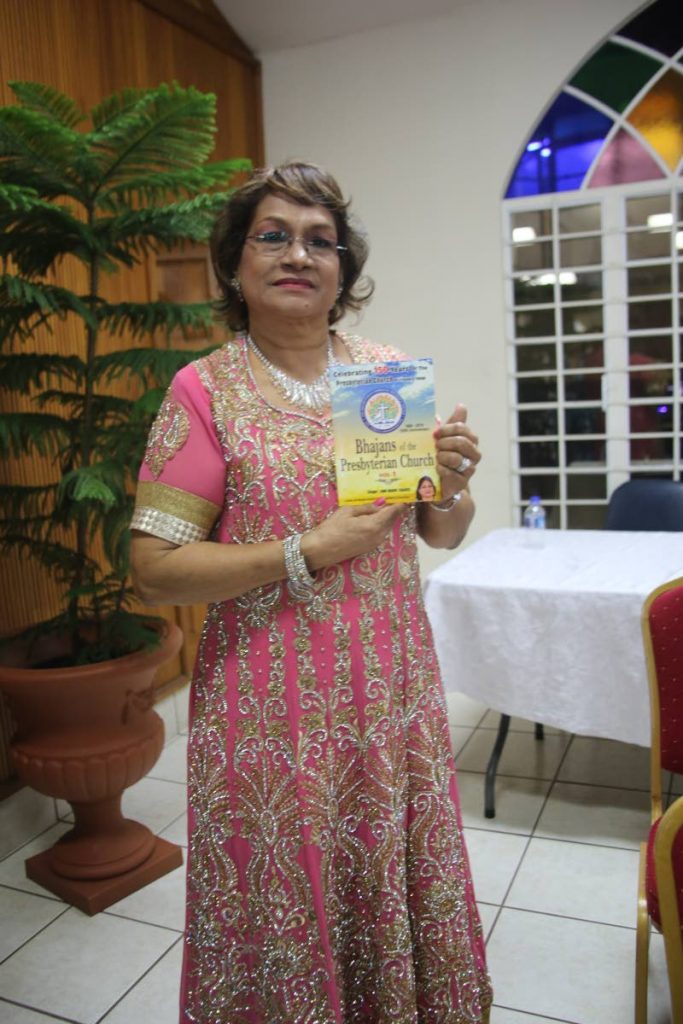 Ann Marie Chadee shows off her first Bhajan CD launched at the 150th anniversary of the Presbyterian Church in TT.
