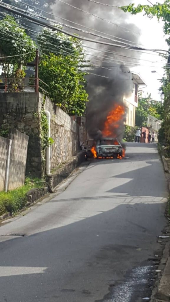 The car in which police believe at least two people were killed in the Trou Macaque shooting. 