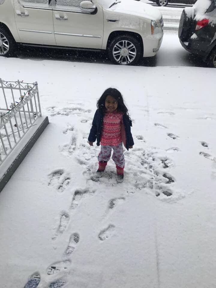 Three-year-old Rianna Balramsingh got to enjoy the snow for a little bit in Ozone Park, Queens, New York before the recent bomb cyclone winter storm hit the eastcoast of the United States. By the time the storm has passed, snow drifts were so high, people found it hard to determine where the sidewalk ended and the road began. PHOTO COURTESY SYLEEN BALRAMSINGH.
