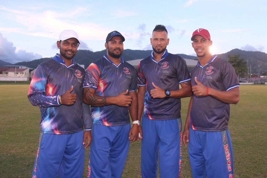 STAR 2017 TEAM: Cane Farm’s (from left) Denesh Ramdin, Ravi Rampaul, Rayad Emrit and Lendl Simmons give thumbs up after a victory in the UWI T20 Tournament.