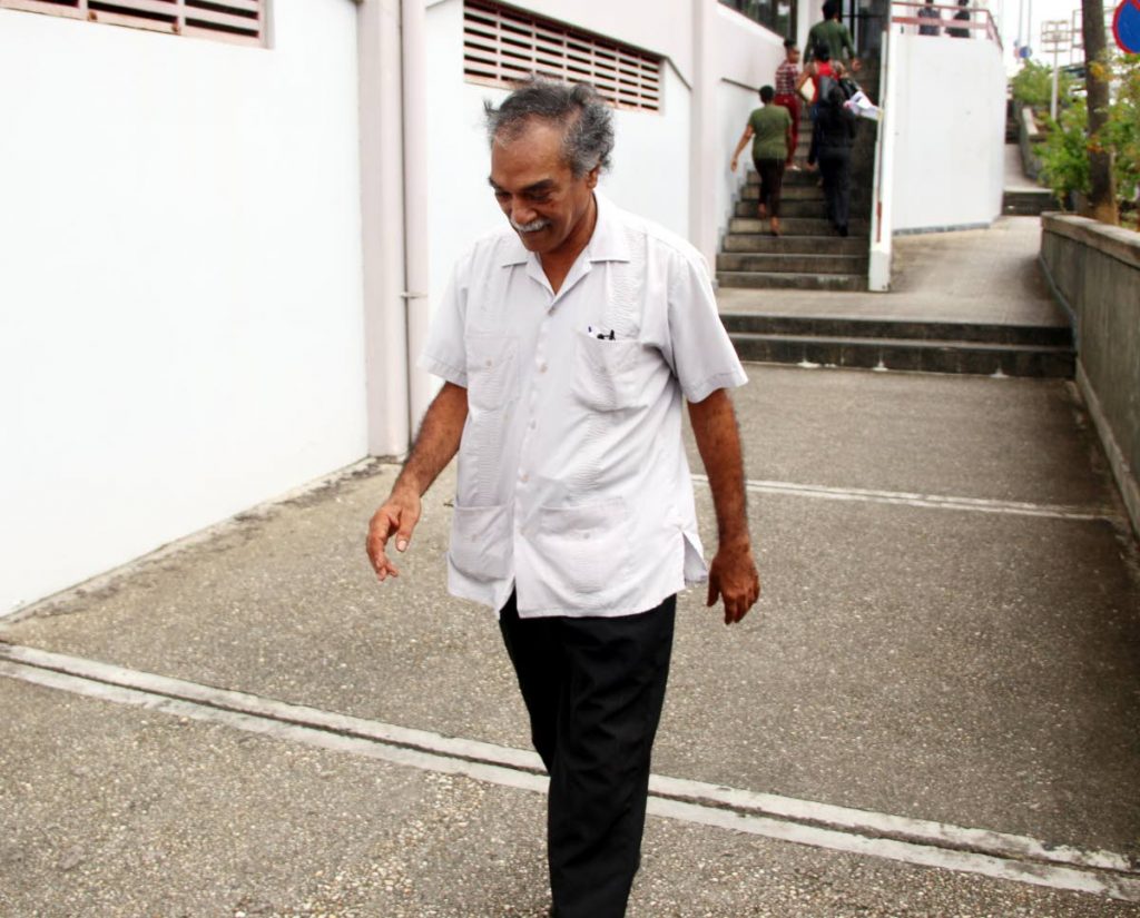 Dr Ronald Budhooram leaves San Fernando Magistrates Court on Thursday.