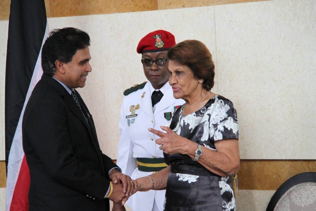 Dr Roodal Moonilal and  Dr Jean Richards at the Parliament ,as her husband the late president  Dr Max Richards is lying in state for viewing. PHOTO SUREASH CHOLAI