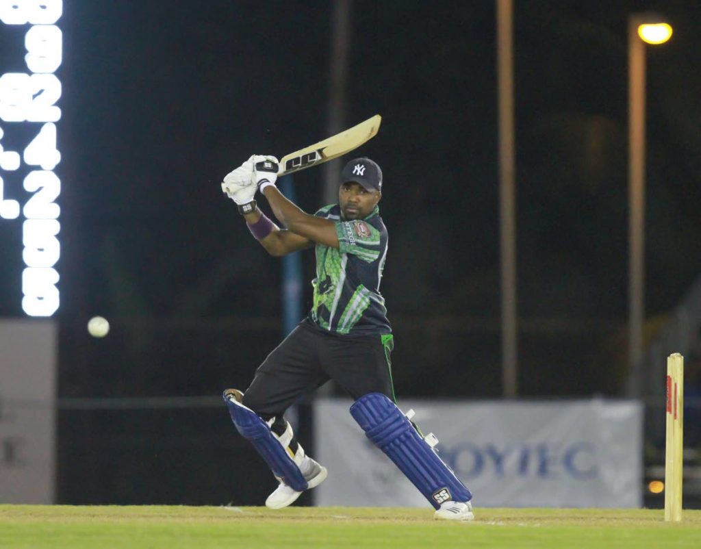 Cane Farm’s Darren Bravo hits a ball to the boundary against Central Sports in the semi-final of the UWI-UNICOM T20 Tournament on Thursday at the Sir Frank Worrell Ground, UWI, St Augustine.