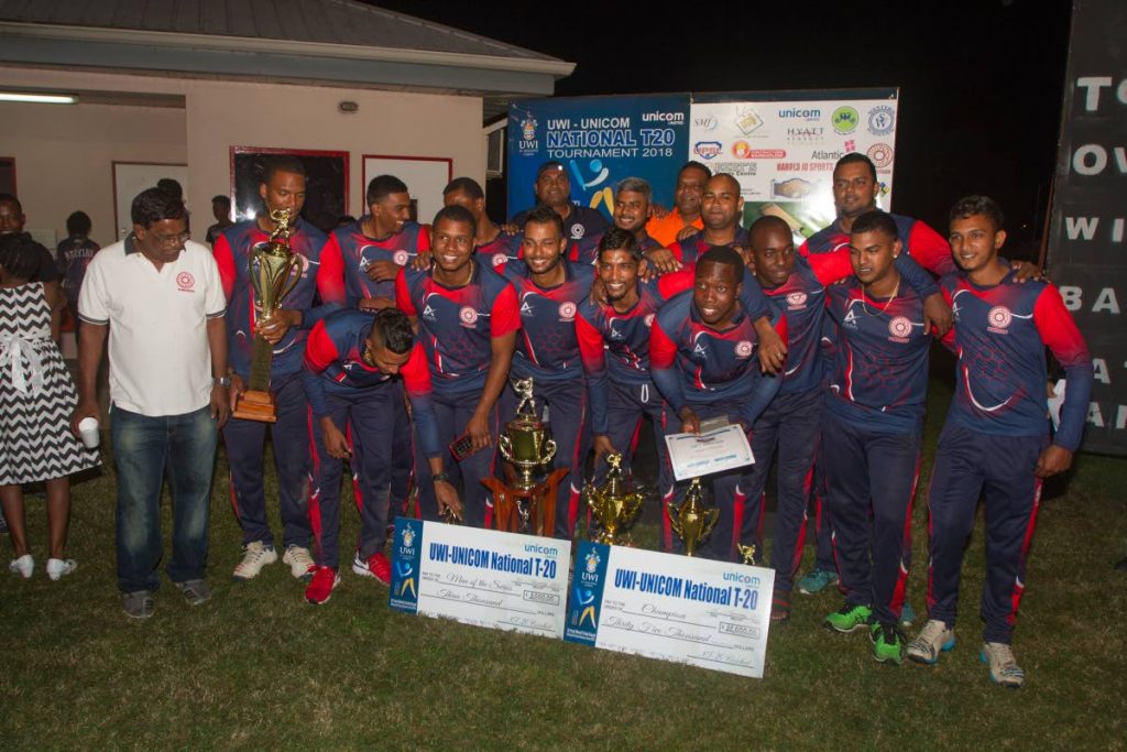 Members of the Powergen team celebrate after winning the UWI-Unicom T20 national final. Powergen defeated Cane Farm by 2 wickets at the UWI Spec Grounds, St Augustine on Saturday night.