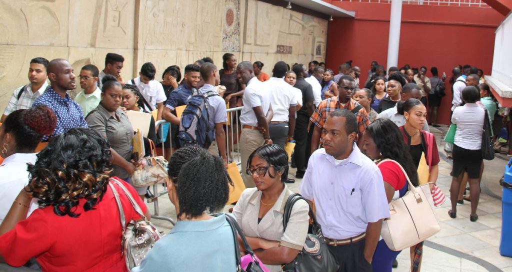 Hundreds of people showed up at the Port of Spain City Corporation on Knox Street  to apply to be municipal police officers. PHOTO SUREASH CHOLAI