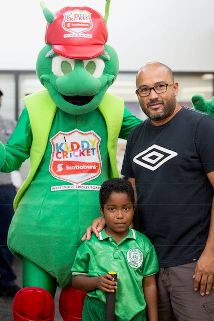 This customer and his son took the time to interact with Chirpy the Scotiabank Kiddy Cricket mascot during their visit to the bank’s Sangre Grande branch.