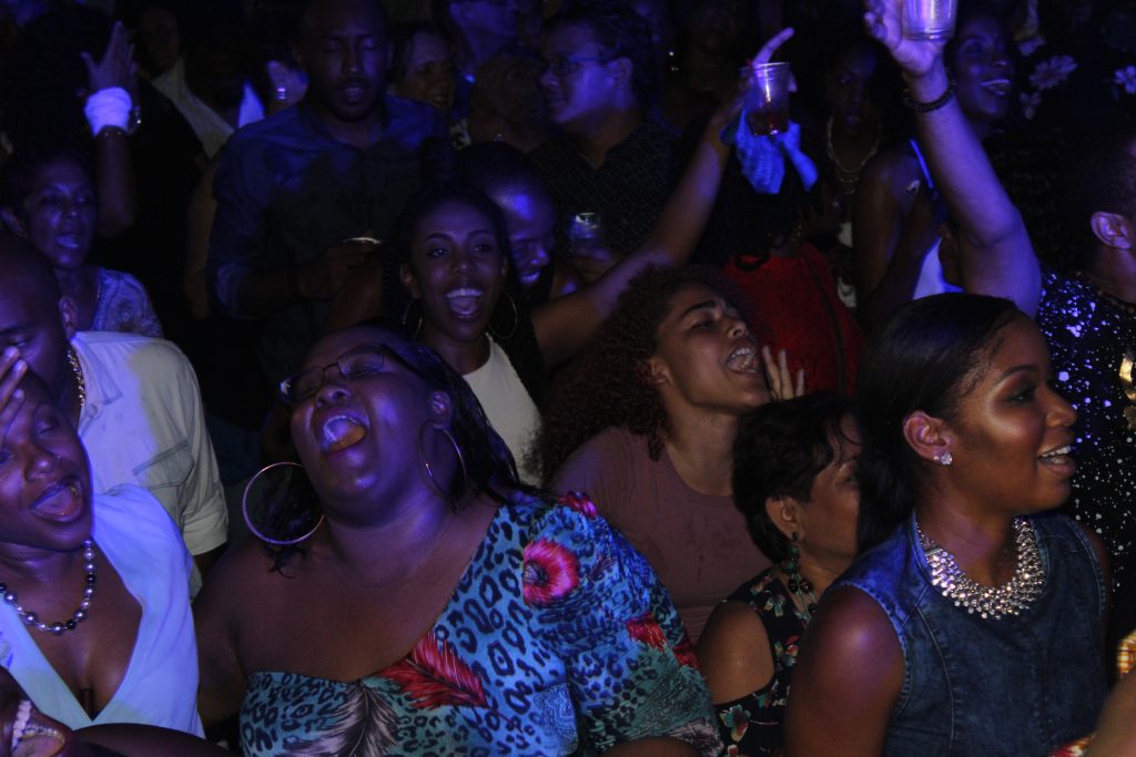 File photo: Patrons scream and cheer for two-time Soca Monarch king Voice as he was making his way on stage for  Bishop's Fete Cocktails, Denims and Diamonds! at Estate 101, Saddle Road last year.