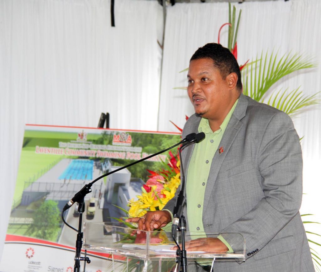 Sport Minister Darryl Smith speaks during the sod-turning ceremony for the Laventille Community Swimming Pool Facility at  Soogrim Trace, Laventille yesterday.