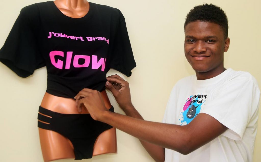 All aglow: Masqueraders will Glow in 17-year-old designer Brandon Callender's J'Ouvert Brand band on Carnival Monday. His mas camp is in St James
PHOTOS BY AZLAN MOHAMMED
