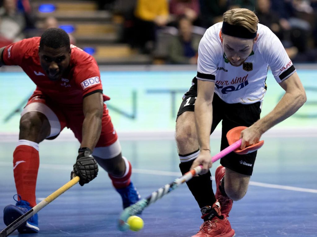 Trinidad and Tobago in action against Germany in a Pool A match at the Indoor Hockey World Cup match on Friday in Germany.