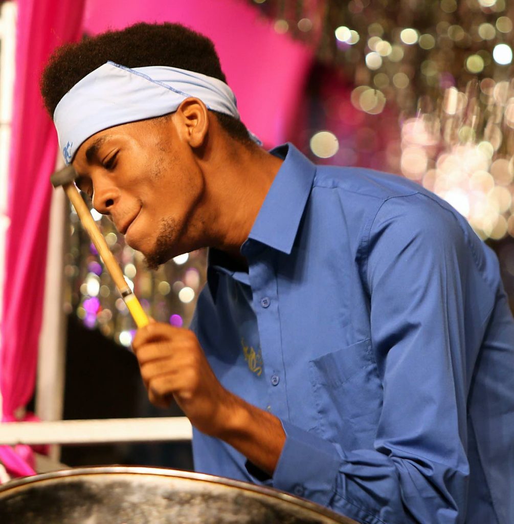 The picture of concentration from this member of Courts Sound Specialist of Laventille, which placed third in the Medium Bands category.
