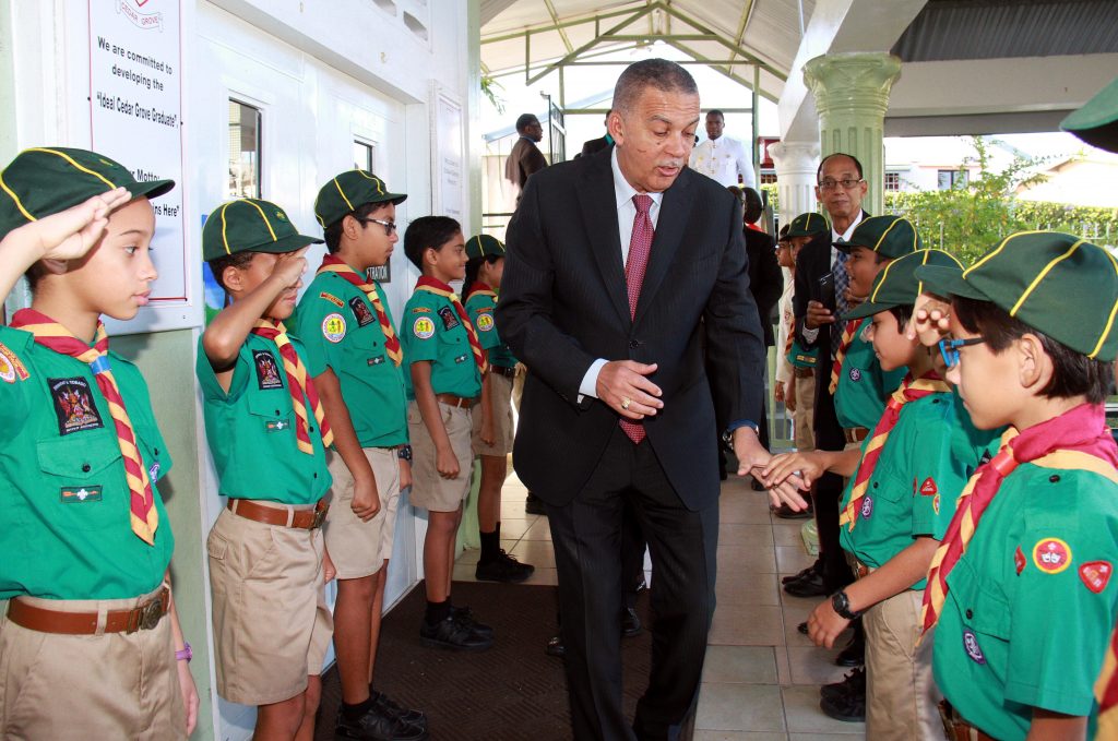 Your Excellency: Cedar Grove Primary School scouts salute President Anthony Carmona during 
a visit to the school in Palmiste on Thursday. Carmona had a outreach to children and young 
people during his presidency. PHOTO BY ANIL RAMPERSAD.