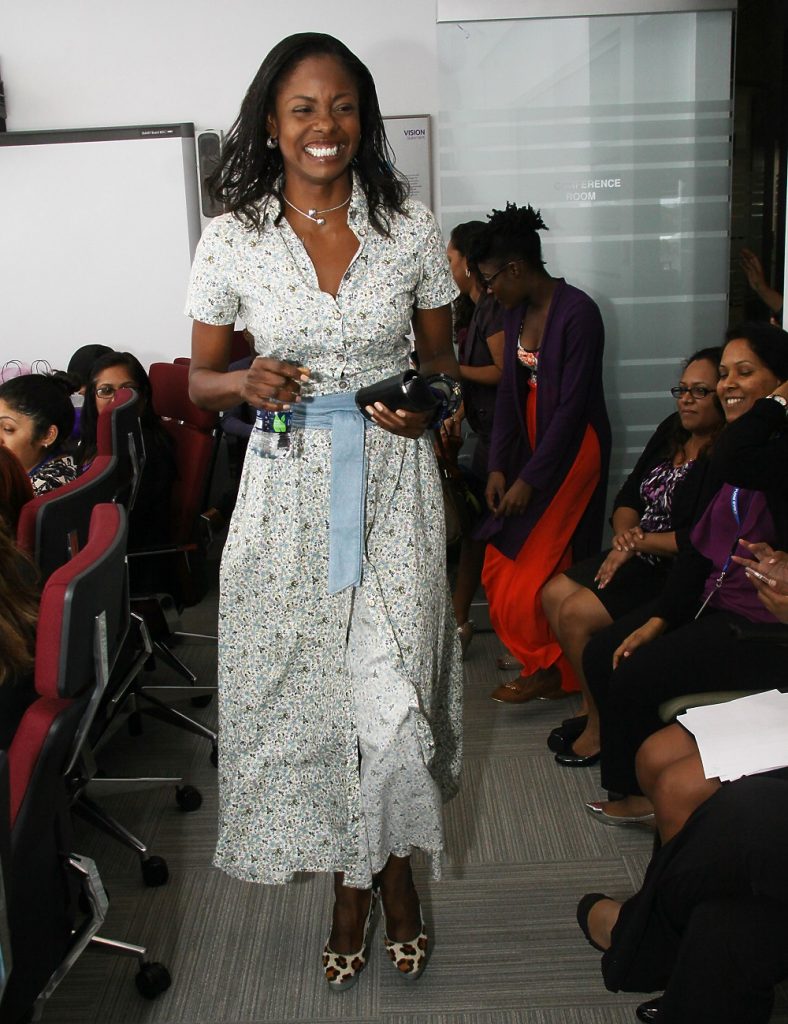 STEPPING IN STYLE: Former Miss Universe 
Wendy Fitzwilliam at the Flow Operations Centre at Trincity Central Road.