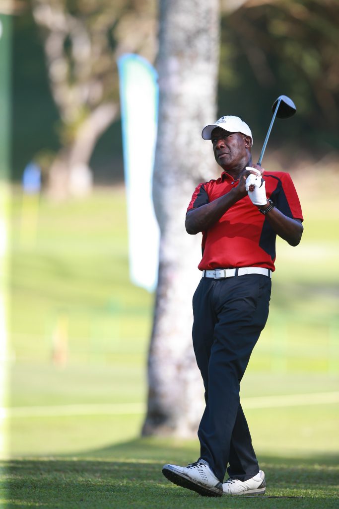 Prime Minister, Dr Keith Rowley, admires his shot off the tee box of the 1st during the ceremonial teeing-off of the TTGA Golf Open 2018 at St Andrew’s Golf Club, Moka.  Photo: Allan V. Crane/CA-images.