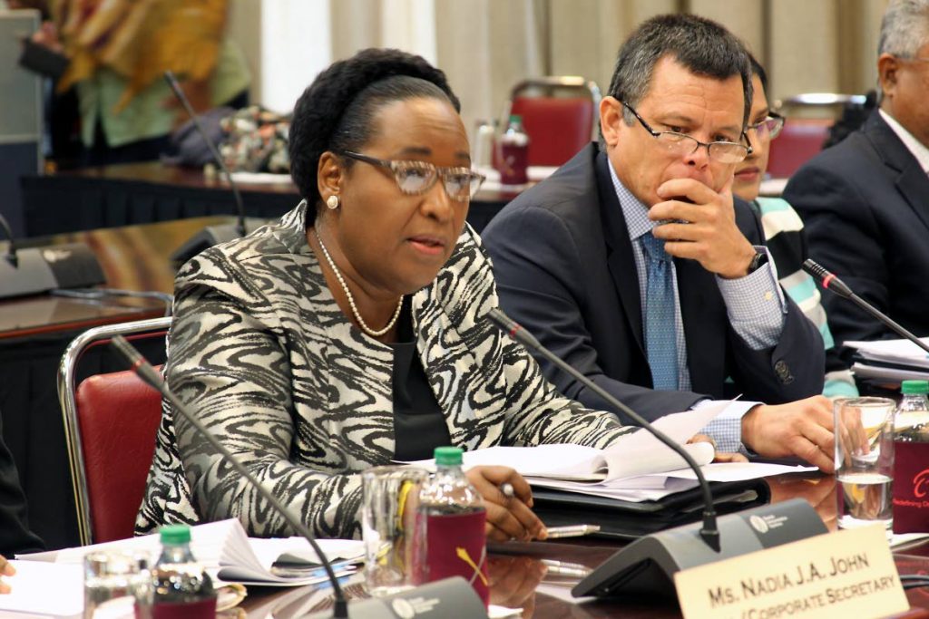 the jsc meeting on local authorities services commissions and statutory authorities [including tha] at parliament ...... here - l to r-...... dr. hyacinth guy chairman and dr. james lee young exec, dir,answering questions from the parliament committee.............. photo by rattan jadoo............ 2-2-18.