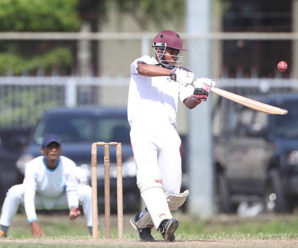 Fatima’s Joshua Araujo-Wilson hits a shot against Barrackpore Secondary in a Powergen Secondary Schools Cricket League match at Fatima Grounds, Mucurapo, yesterday.