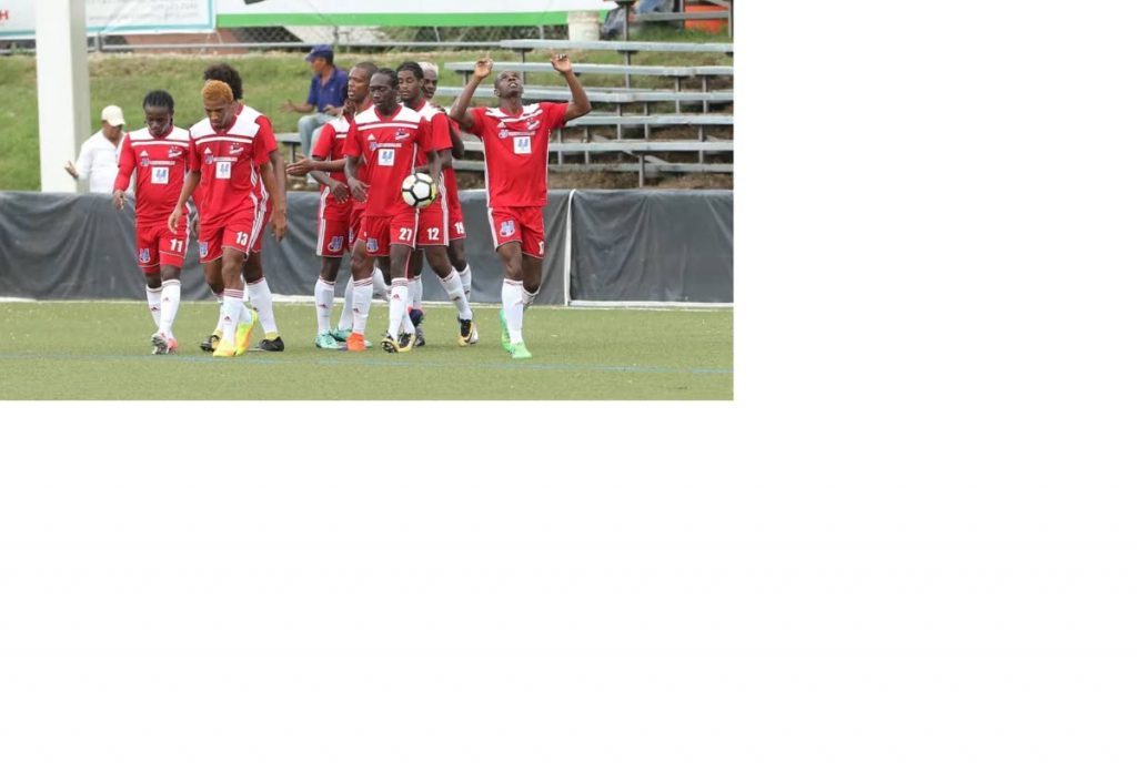 Members of Central FC celebrate a goal against Racing FC in CONCACAF Caribbean Club Championship action on Friday.