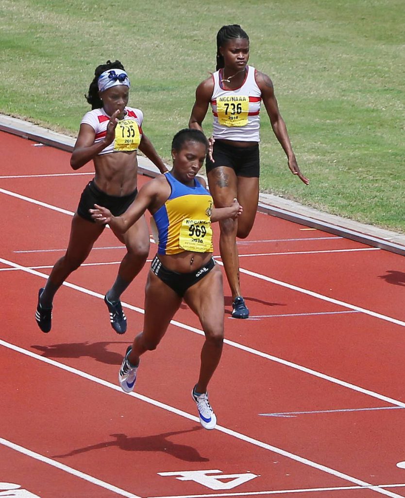 Reyare Thomas wins the women’s 100m final on Saturday at the NAAA pre-Commonwealth meet at the Hasely Crawford Stadium, Mucurapo.