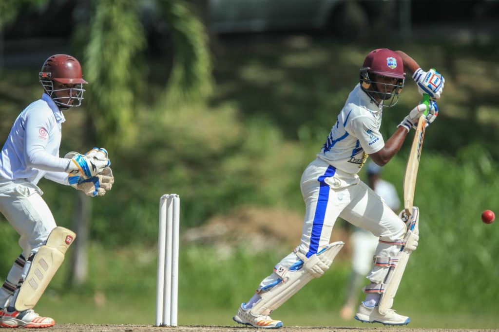Naparima’s Cephas Cooper plays a shot against Fatima in a Powergen Secondary Schools Cricket League match at Lewis Street, San Fernando, yesterday.