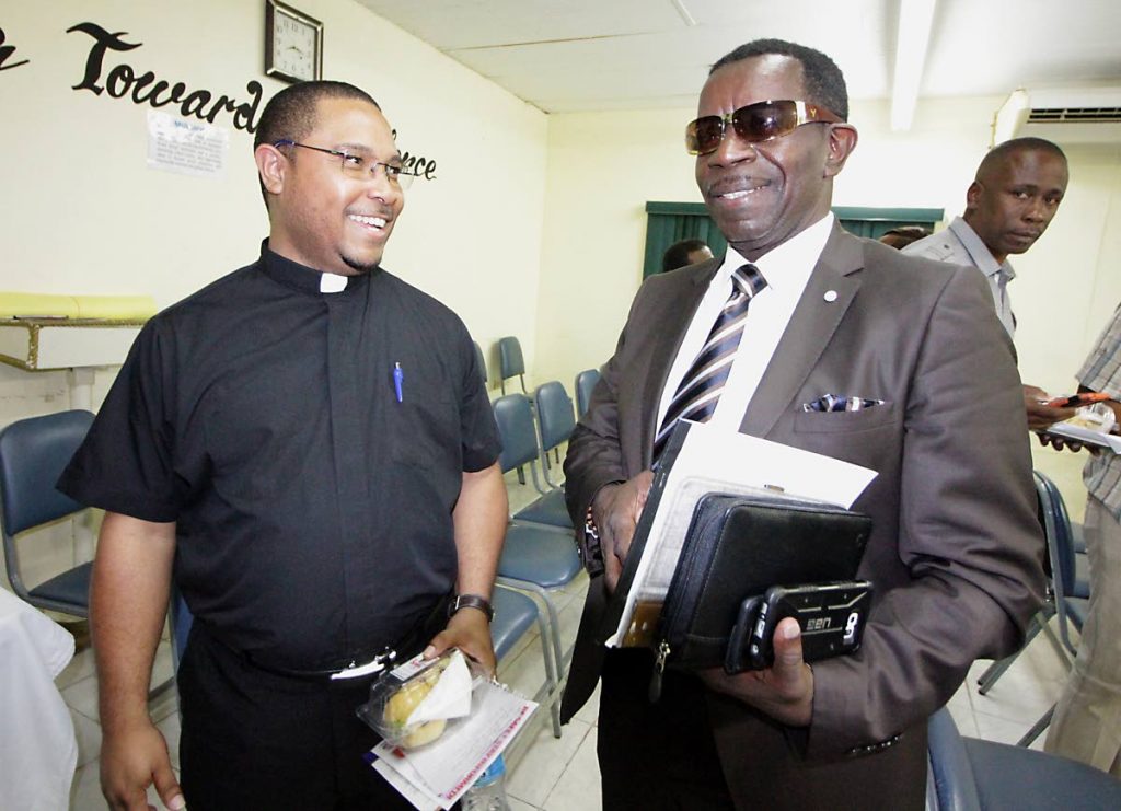 Radcliffe Boxhill, Assistant Commissioner of Police (North West) and Fr. Aston Gomez, Rector at St Michael Anglican Parish
The Town Meeting hosted by Western Division of T&T Police Service, Deigo Martin Central Secondary, Wendy FitzWilliams Blvd, Diego Martin, Wednesday night, 