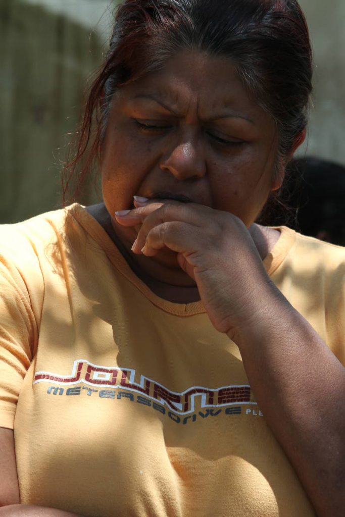 Last moment: Sharon Ramsingh-Gopie, sister of murder victim 
Roddy Ramsingh as she relives her last interaction with him at her Mon Desir home in Fyzabad yesterday. PHOTO BY JEFF MAYERS