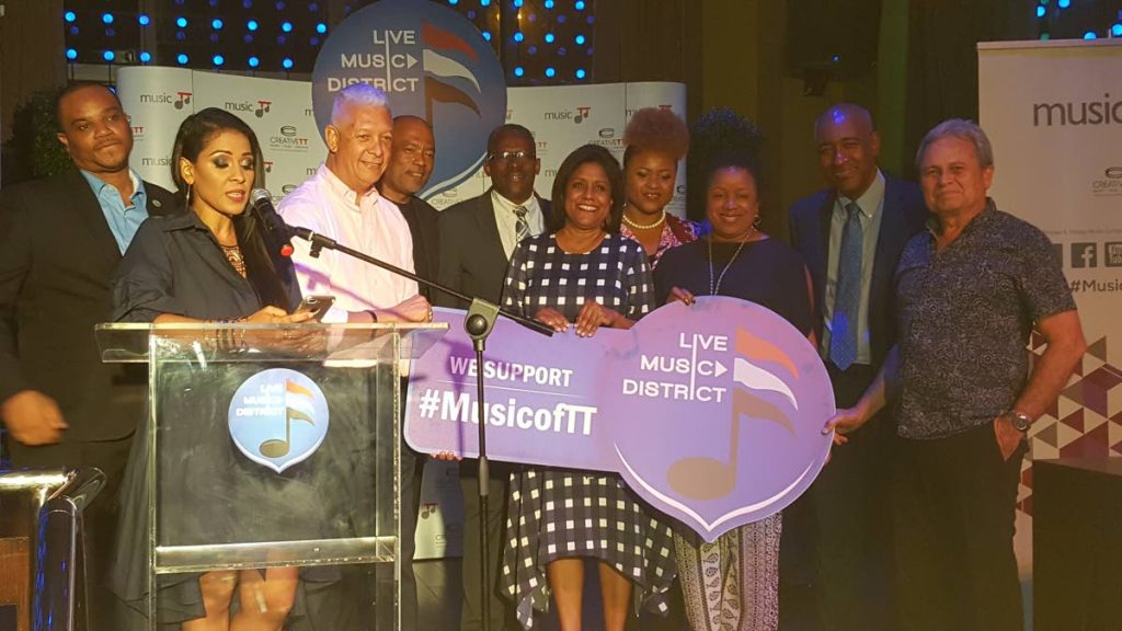 Principals at the Live Music District (LMD) launch from left, Quesi Des Vignes, THA councillor; Jeanelle Frontin, general manager,  MusicTT; Joel Martinez,   Mayor of Port of Spain; Calvin Bijou, chairman CreativeTT; Major Gen Edmund Dillon, Minister of National Security; Sena Paula Gopee-Scoon,  Minister of Trade and Industry, Dr Nyan Gadsby-Dolly, Minister of Community Development,Culture and the Arts; Sen Allyson West,  Minister in the Finance Ministry;  Robert Lee Hunte, Minister of Public Utilities; and Colm Imbert, Minister of Finance.