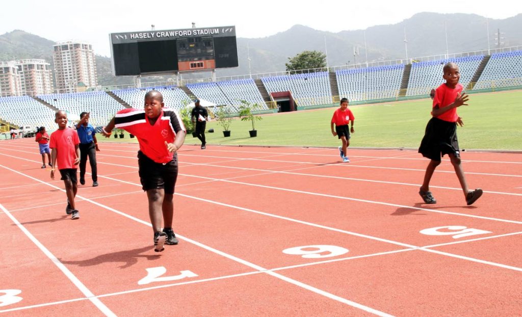 A group of athletes competing in the 25-metre walk, in the six-10-year age group, at the Hasely Crawford Stadium, Mucurapo.