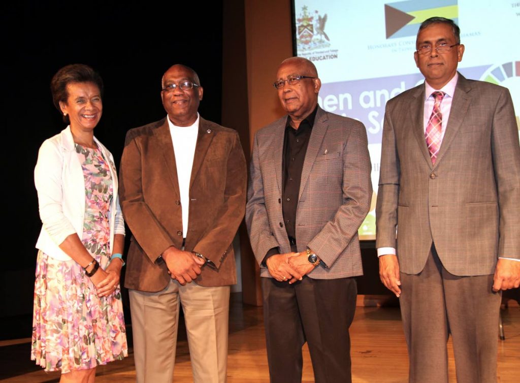 Education Minister Anthony Garcia (second from right) with The UWI lecturer and Honorary Consul for the Bahamas Dr Monica Davis, The UWI’s principal Prof Brian Copeland and campus dean Prof Terrence Seemungal at the Women and Girls in Science conference at The UWI’s Learning Resource Centre in St Augustine yesterday. PHOTO BY SUREASH CHOLAI