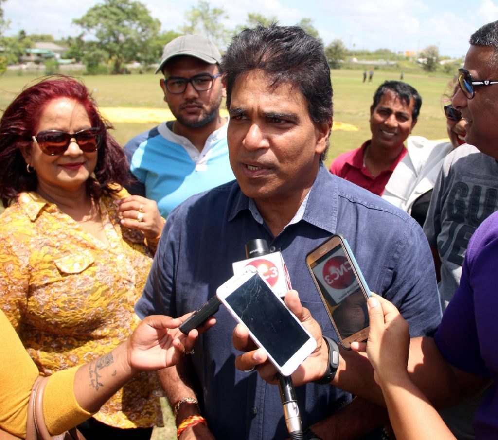 LAST TIME: Oropouche East MP Dr Roodal Moonilal speaks with 
reporters at the UTT, Tarouba ground on Sunday.