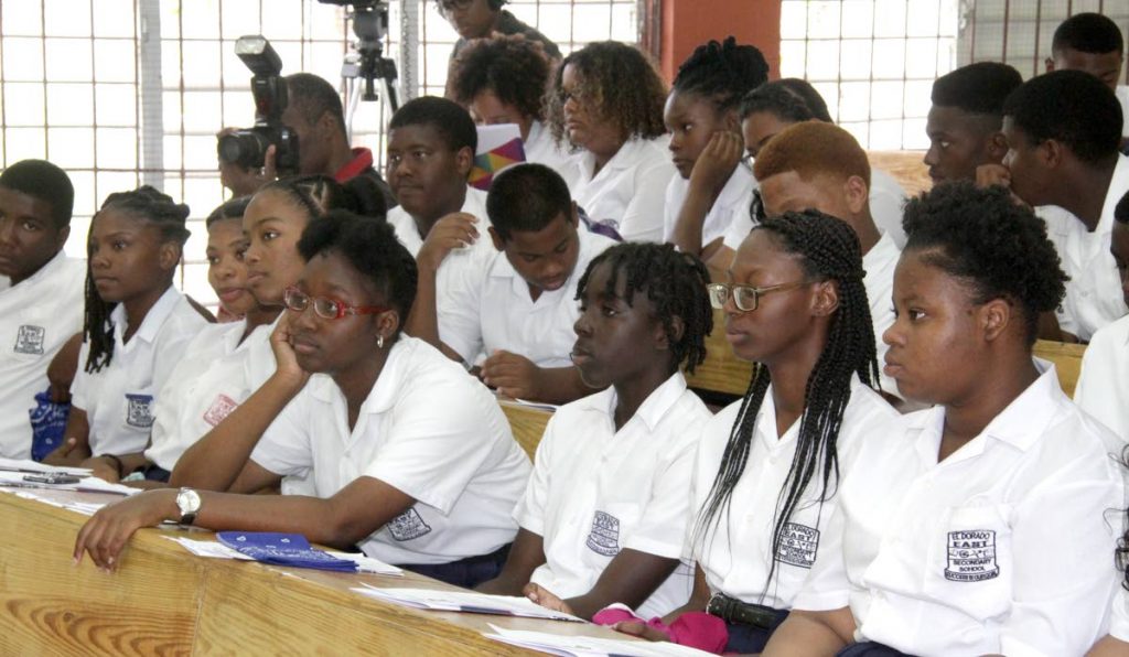 ATTENTIVE: Students of El Dorado Secondary School at the Commonwealth Day event at the school on Monday.