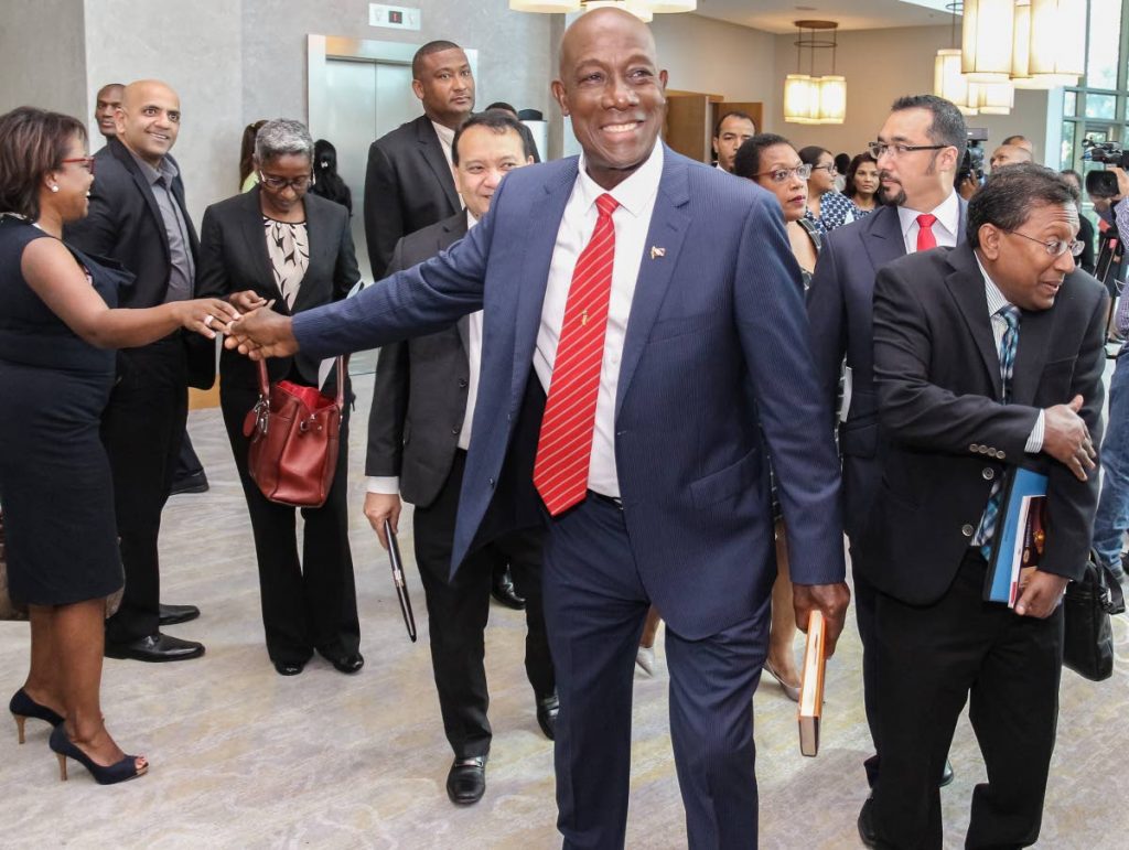 Prime Minister Dr Keith Rowley leaves the Spotlight on Energy conference yesterday at the Hyatt Regency in Port of Spain.