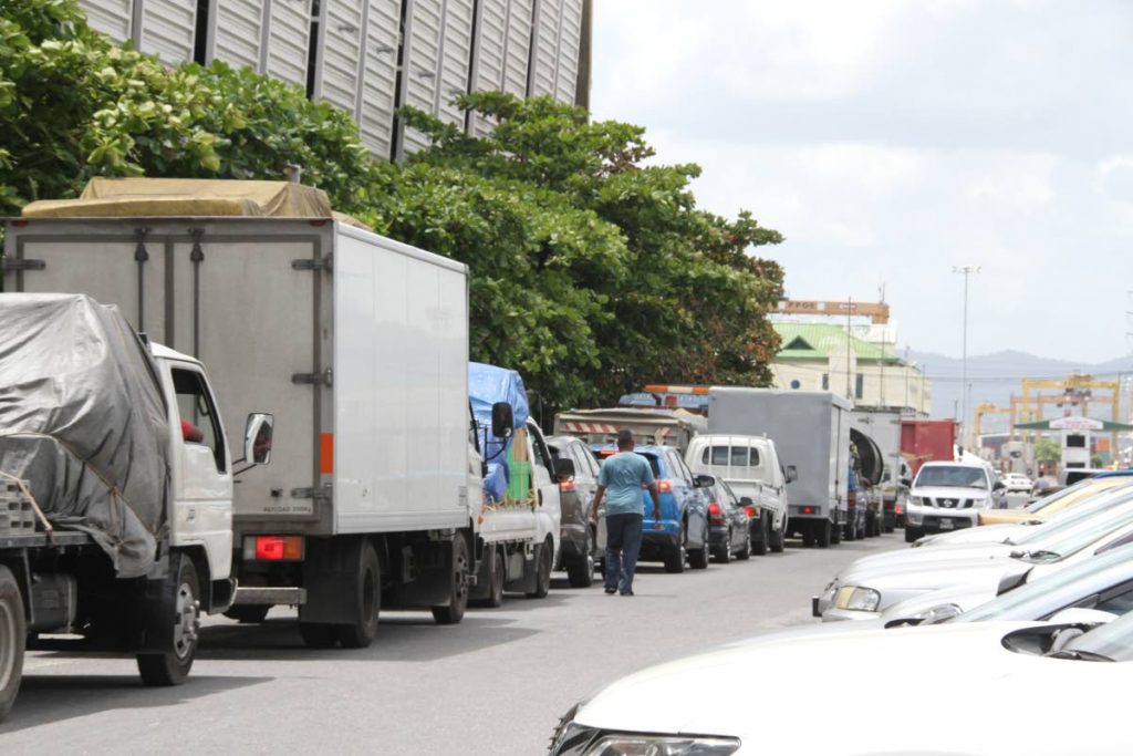 Trucks line up on Dock Road Port of Spain waiting to board the Cabo Star for Tobago. 15-03-18 PHOTO SUREASH CHOLAI