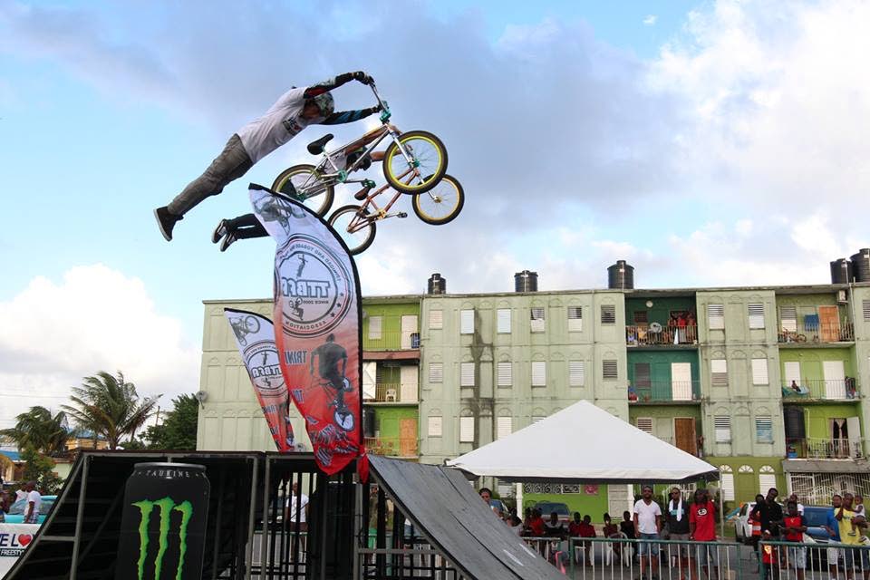 Two BMX riders show residents of Maloney their skills on Sunday.