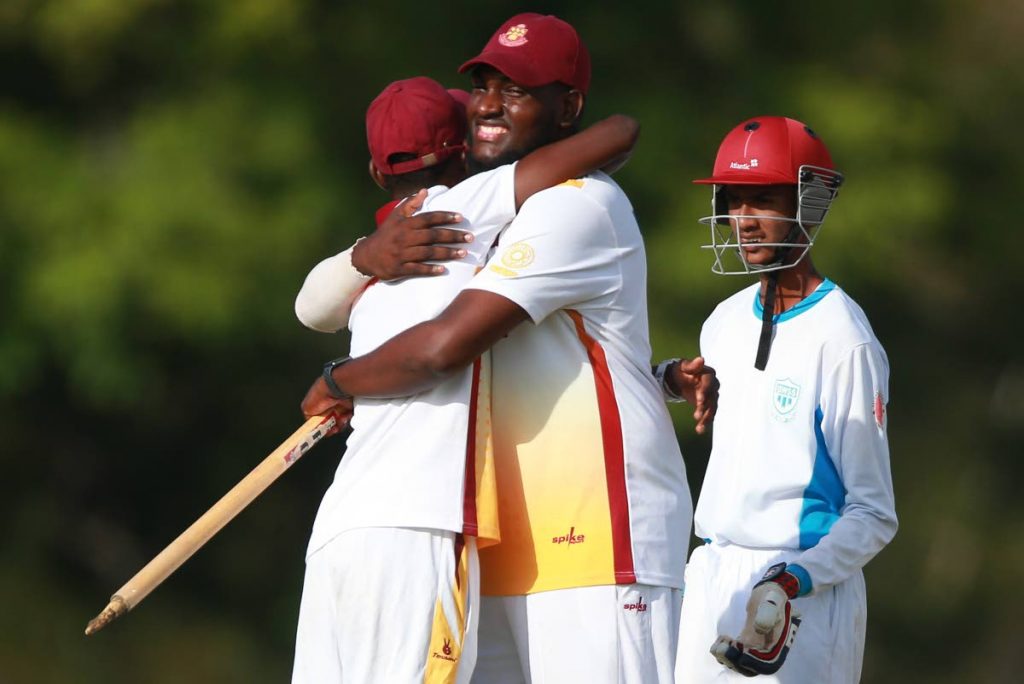Hillview players celebrate following their dismissal of Barrackpore West’s final wicket from Dillon Jugmoman (right), following  the Secondary Schools Cricket League match between Hillview College and Barrackpore West Secondary at Honeymoon Park, El Dorado yesterday. Hillview won and were crowned SSCL 2018 Champions.