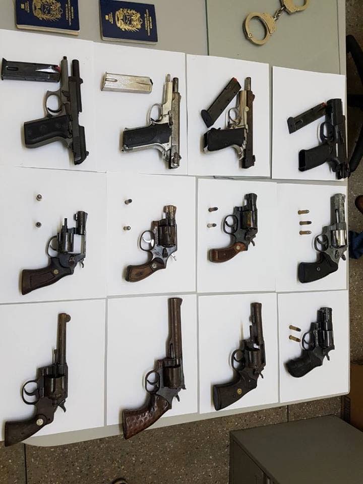 File photo of 12 firearms found in La Romain by South Western Division police.