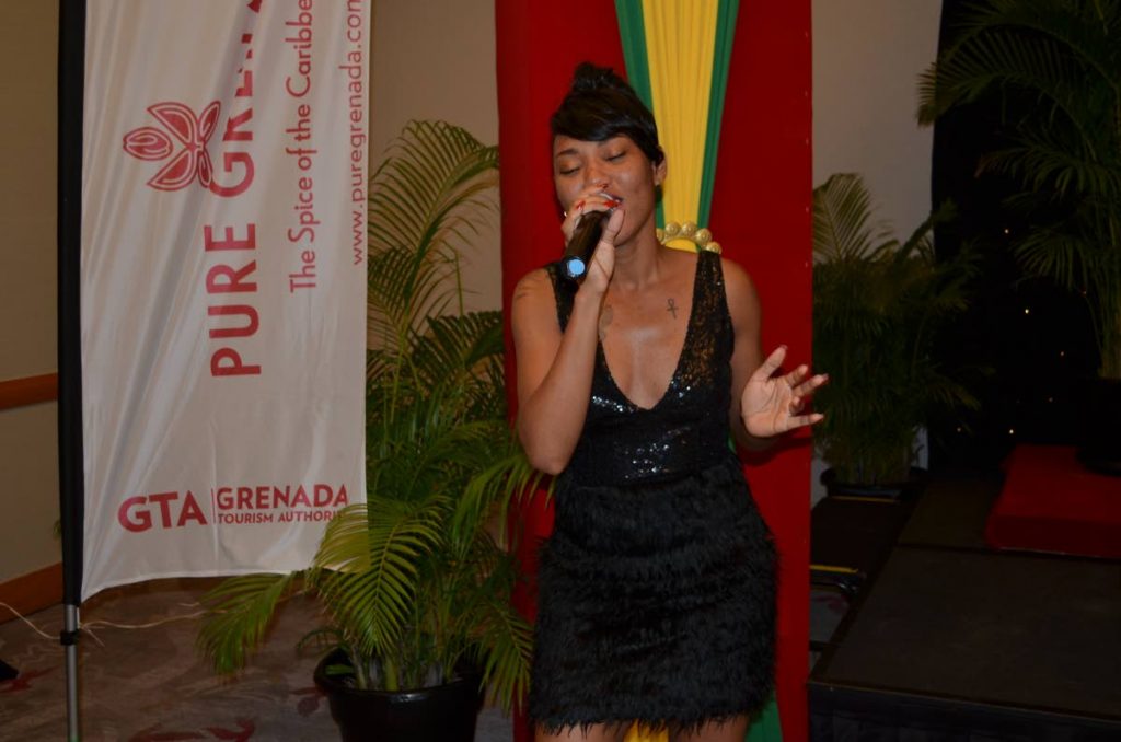 Grenadian singer Tami Baldeo entertains guests.