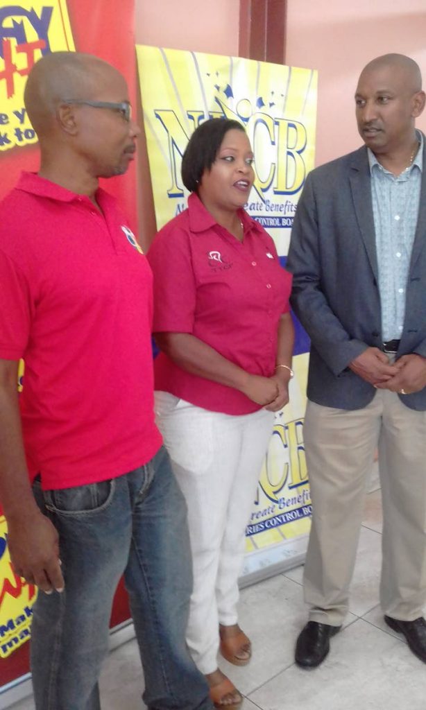 Robert Farrier (right), president of the Trinidad and Tobago Cycling Federation (TTCF), chats with TTCF public relations officer Roxanne Ramnath (centre) and secretary of Madonna Wheelers club Joseph Charles-Walcott after yesterday’s media conference.