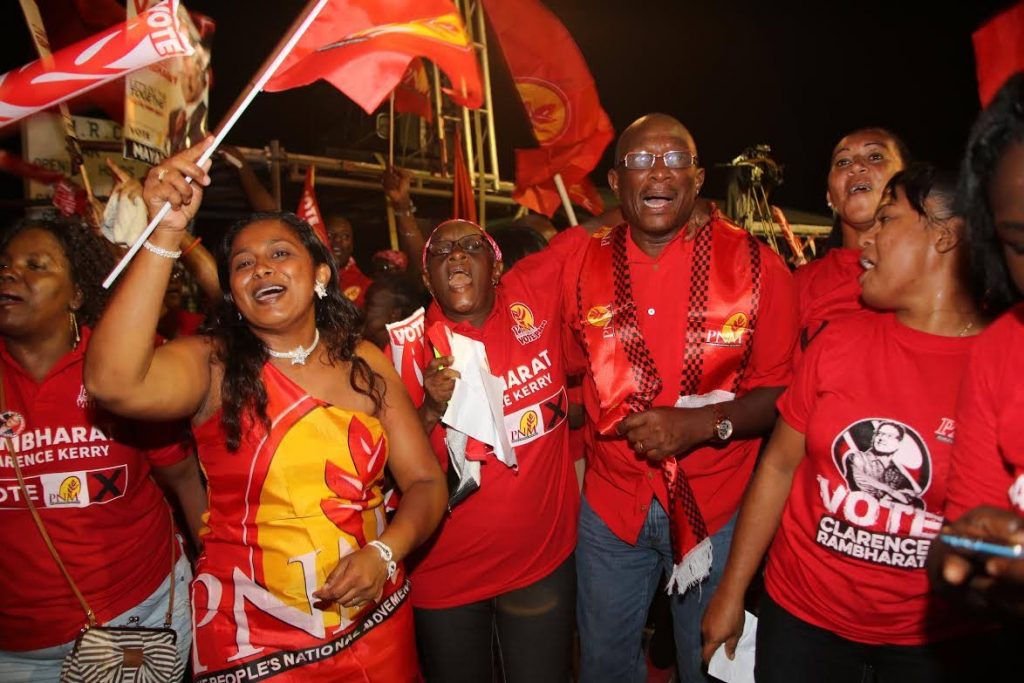 Winston “Gypsy” Peters in a celebratory mood with PNM supporters in a Rio Claro meeting during the 2015 general election campaign.