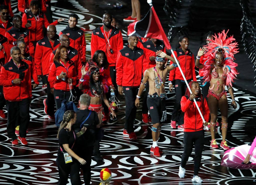 Team TT is led by flag bearer Michelle-Lee Ahye at Carrara Stadium for the opening ceremony for the 2018 Commonwealth Games on the Gold Coast, Australia, earlier today. (AP Photo)