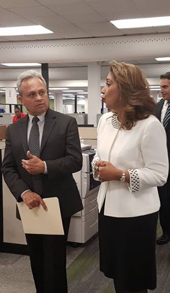 (Left) Finance Minister Colm Imbert gets a tour of Scotiabank TT's Operations and Shared Services Company (OSSC) in Chaguanas by the company's vice-president Carlene Seudat on April 4, 2018.
Also on the tour (in back, left to right) are Scotiabank TT's managing director Stephen Bagnarol, OSSC chairman David Noel and Scotibank TT director Derek Hudson. PHOTO COURTESY SCOTIABANK TT
