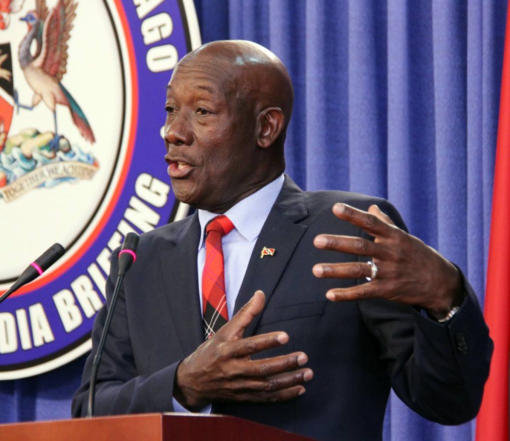EMBARRASSED: Prime Minister Dr Keith Rowley addresses the media at yesterday’s post-Cabinet briefing at the Diplomatic Centre in St Ann’s. PHOTO BY SUREASH CHOLAI