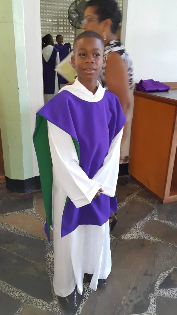 Osaze Badal is an altar server at St Francis of Assisi RC Church, Sangre Grande. He underwent life-saving heart surgery on March 28 during Holy Week.

PHOTOS COURTESY THE BADALS