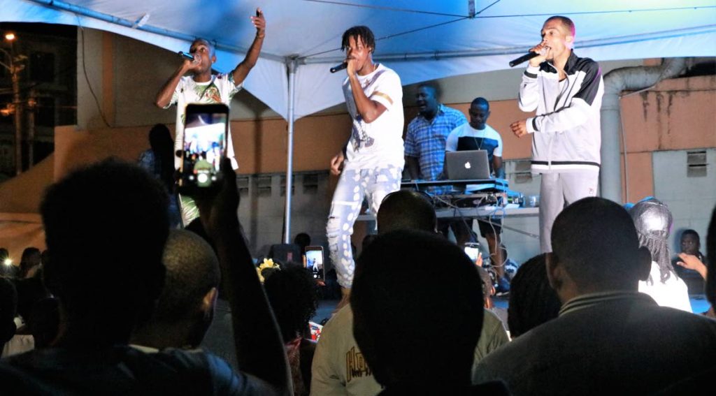 The Regulaz performs Show Me, on stage after launching the video in their home community of Paradise Heights, Morvant.