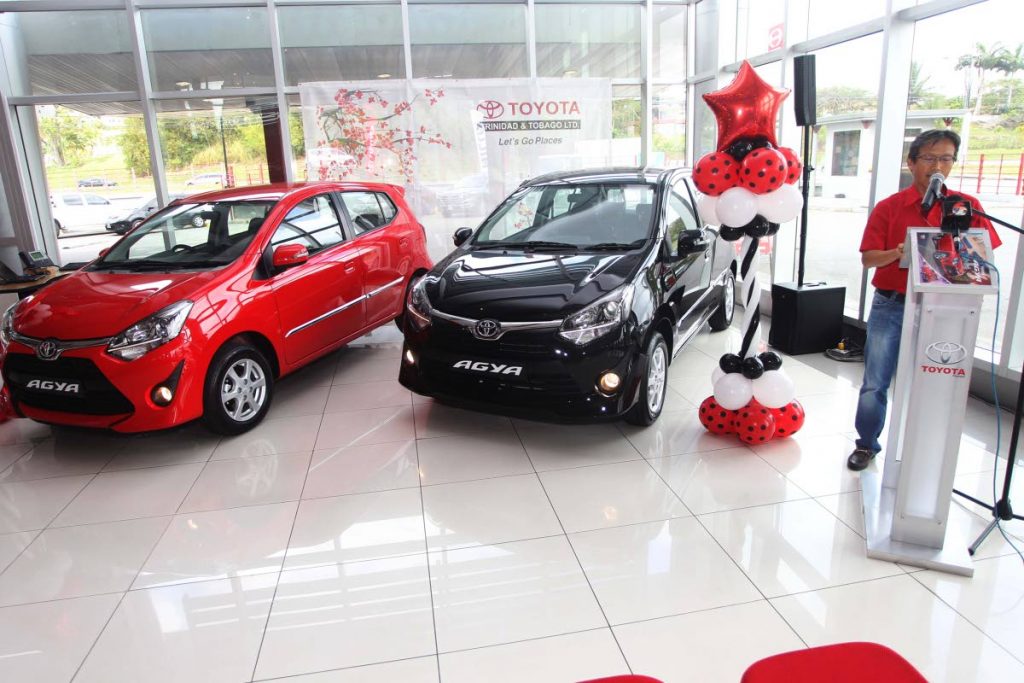 Shigeru Ito, president of Toyota (Trinidad and Tobago) Ltd introduces the new Agya hatchback series at the company’s branch in San Fernando last Saturday. PHOTOS BY LINCOLN HOLDER