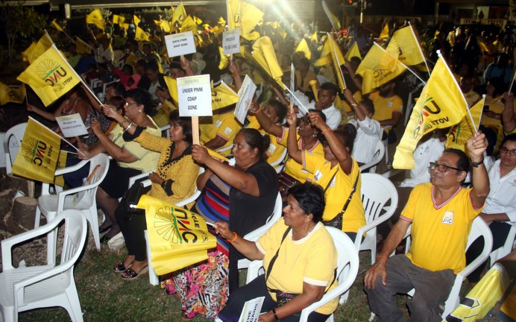 Supporters of the United National Congress in a jubilant mood at the party’s Monday Night Forum at the Rochard Douglas Presbyterian School.